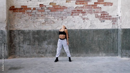 Female dancer performing in urban street