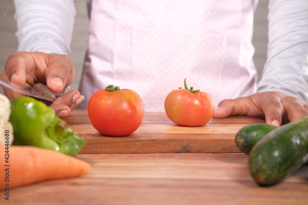 fresh tomatoes on a chopping board fresh tomatoes on a chopping board