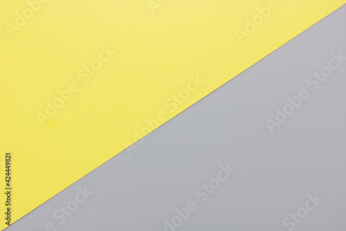 Free Download Flat lay. Top view blank yellow and gray paper background with copy space. Trendy theme of color of the year 2021. Ultimate gray and Illuminating. Color paper background. - GFXLoad