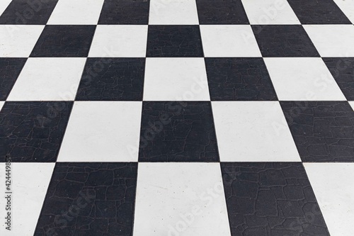 White and black indoor ceramic tile floor pattern and background seamless