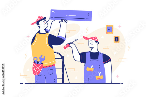 Male workers repairing detail