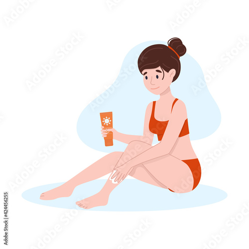 The woman is smeared with sunscreen. Self-care concept.