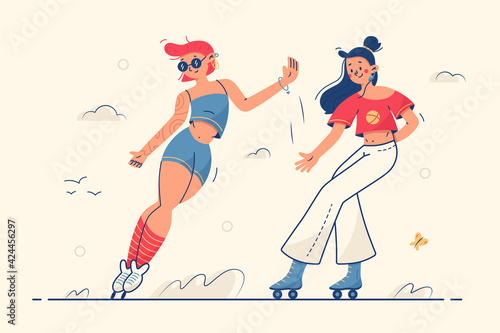 Cute girls roller skaters outdoors