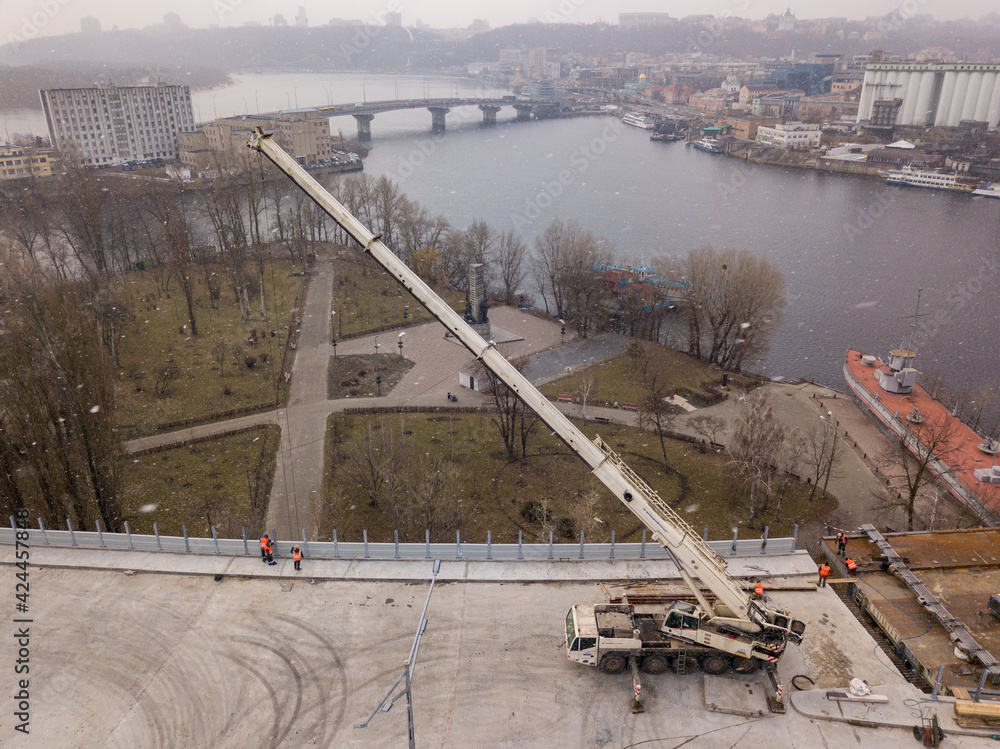 Fototapeta premium Bridge under construction in Kiev. Aerial drone view.