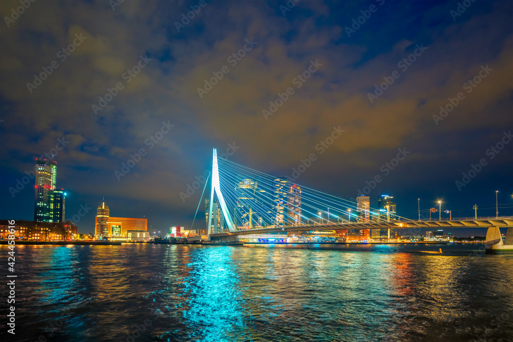 View of Erasmus Bridge Erasmusbrug and Rotterdam skyline. Rotterdam, Netherlands View of Erasmus Bridge Erasmusbrug and Rotterdam skyline. Rotterdam, Netherlands