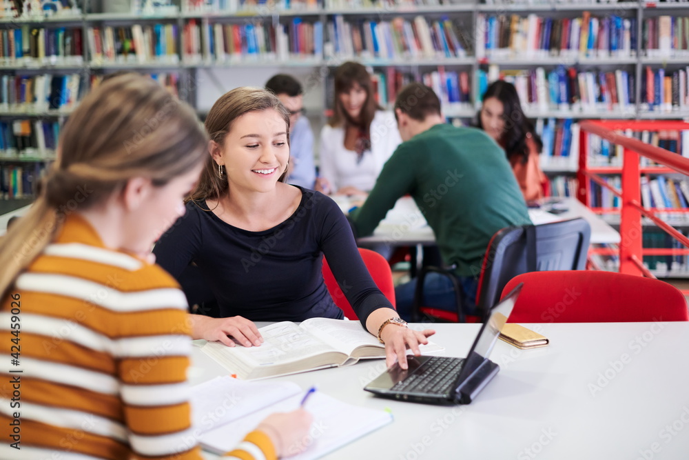 the student uses a notebook and a school library the student uses a notebook and a school library