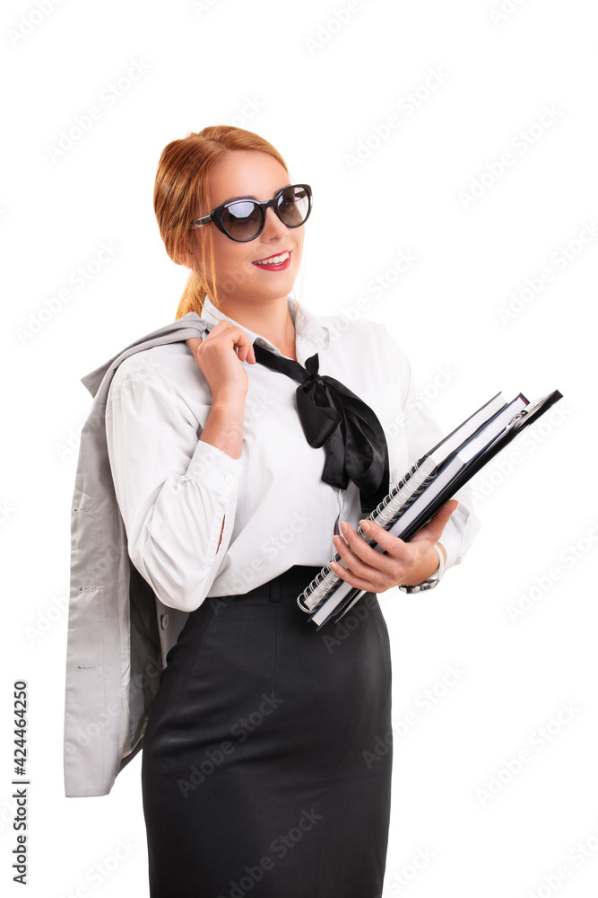 Young fashionable businesswoman holding notebooks and clipboard