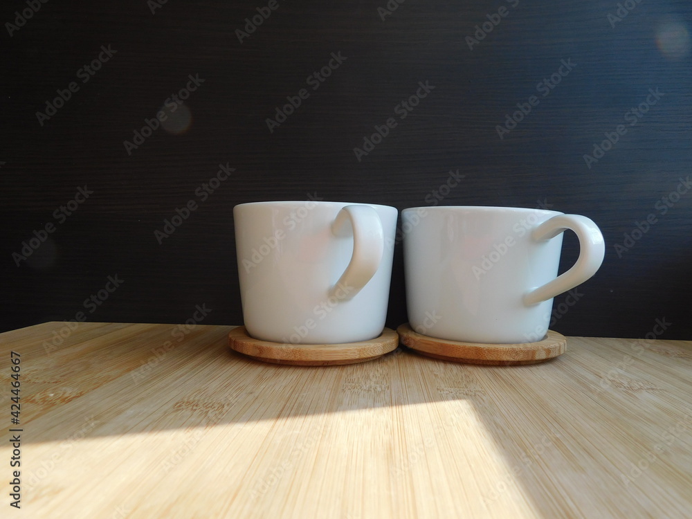 Cup of coffee on wooden table, top view. Cup of coffee on wooden table, top view.