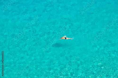 the young woman swims alone © Anna