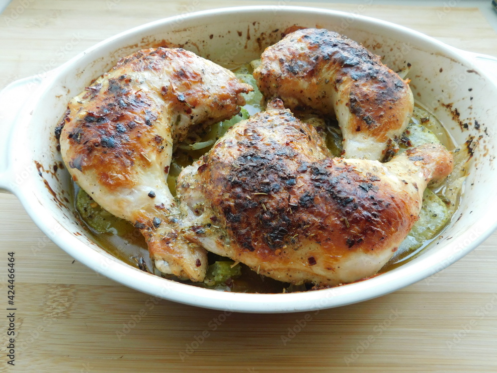 Chicken Legs with Vegetables on wooden table. Chicken Legs with Vegetables on wooden table.