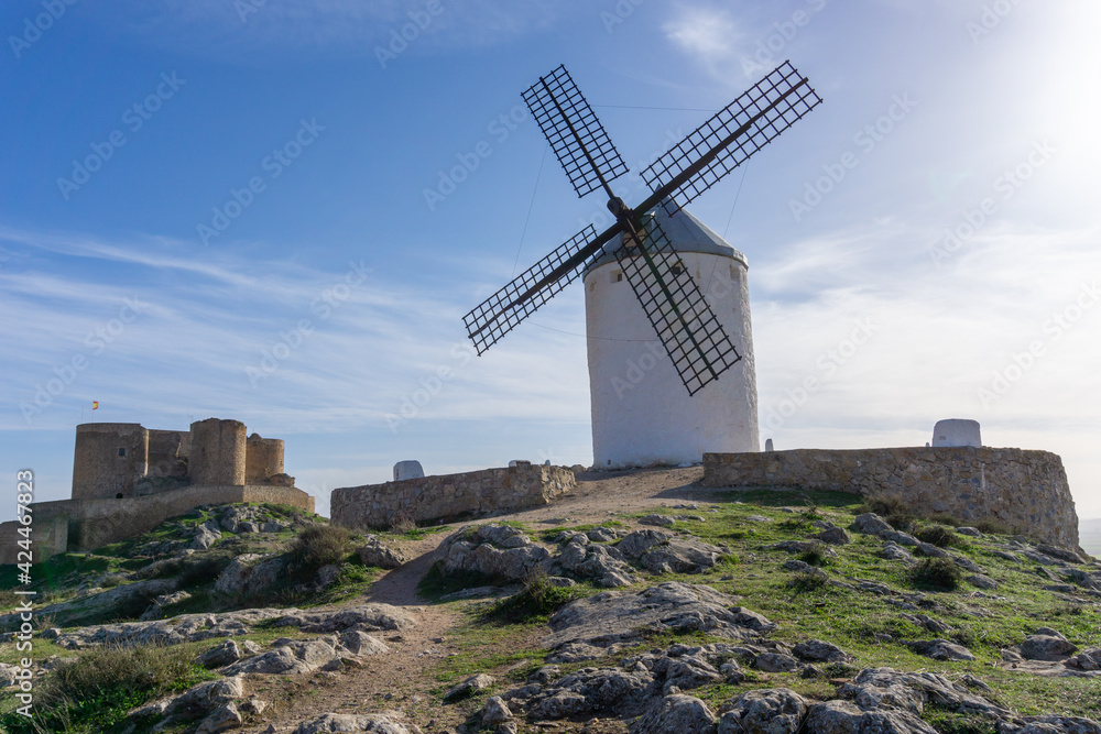 view of the windmills and castle of Consuegra in La Mancha in central Spain view of the windmills and castle of Consuegra in La Mancha in central Spain