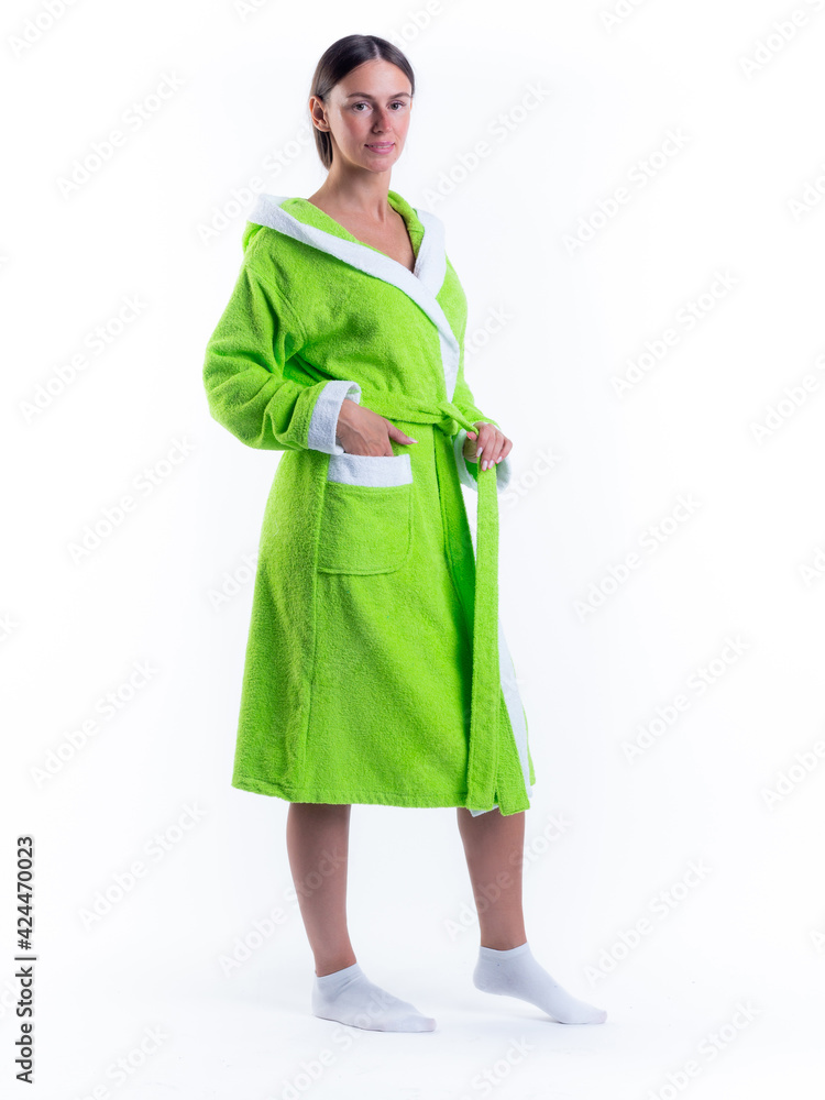 woman in a Bathrobe on an isolated white background with a smile on her face. woman in a Bathrobe on an isolated white background with a smile on her face.