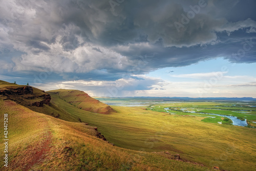 Thunderstorm with clouds and rains over the steppes and mountains of Khakassia park chests Tarpig © Vladimir Lyakishev