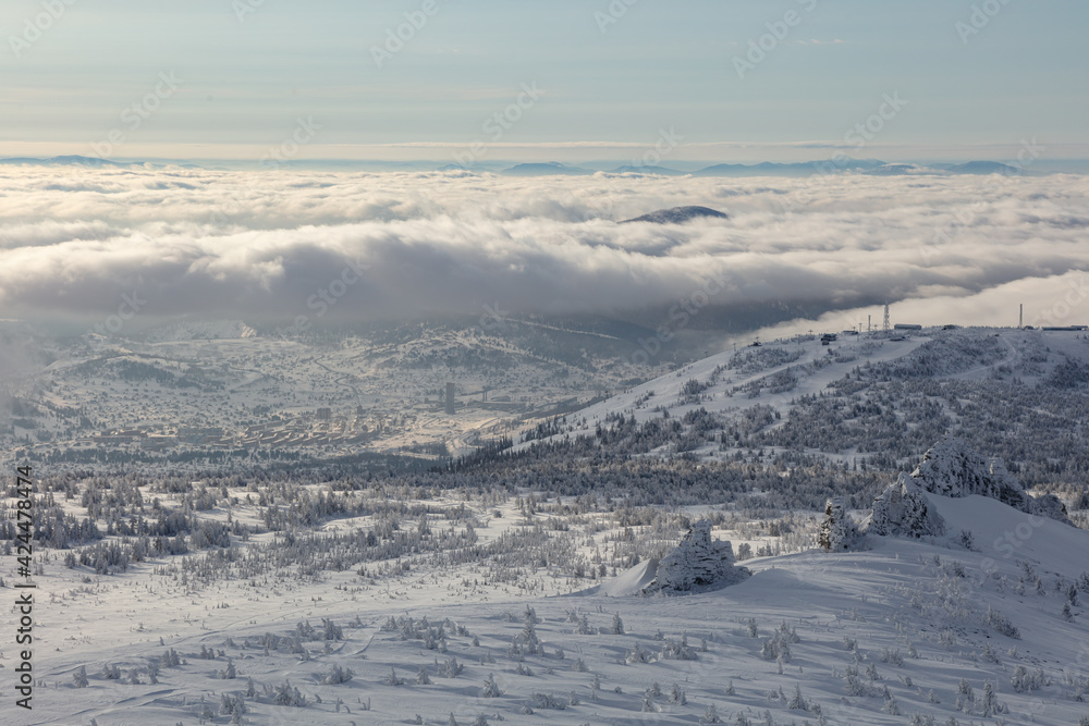 beautiful winter landscape high in the mountains. sunrise and sunset in a winter resort without people. christmas card