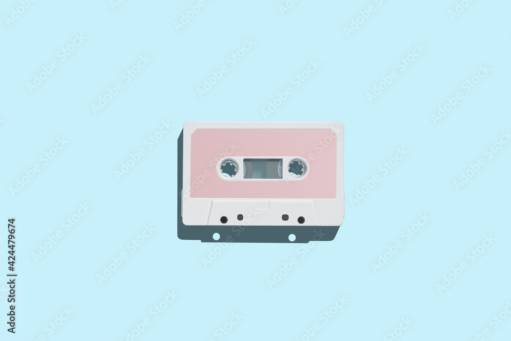Audio cassette. Vintage white audio cassette tap on colored background. Old cassette tape audio isolated on white.
