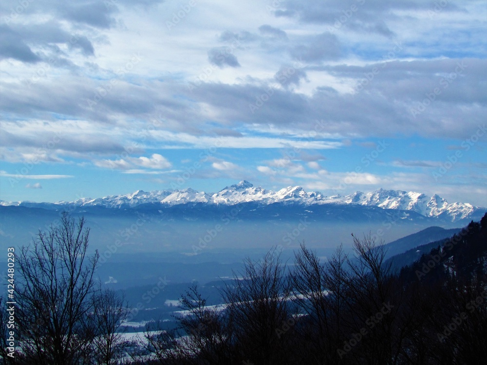 View of the peak of Triglav mountain in Julian alps, Gorenjska, Slovenia overed in snow View of the peak of Triglav mountain in Julian alps, Gorenjska, Slovenia overed in snow