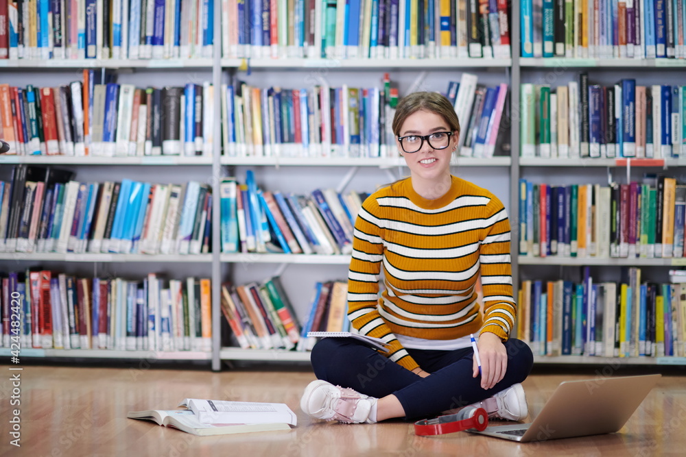 the student uses a notebook and a school library the student uses a notebook and a school library