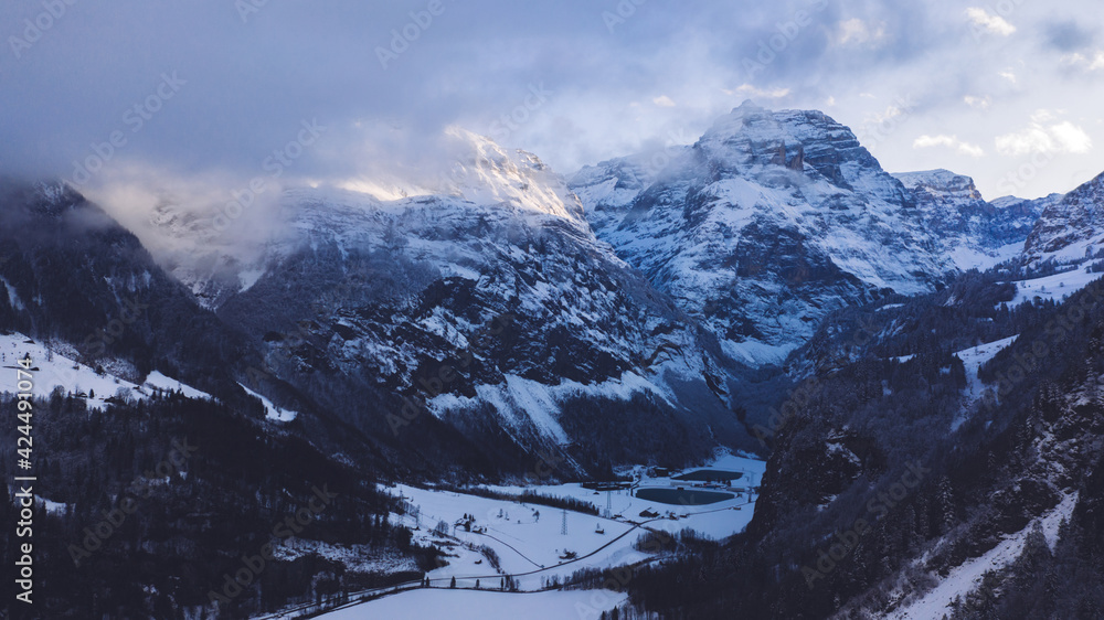Mountainous terrain covered with snow