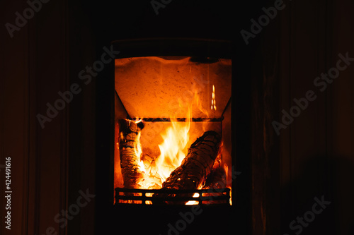 Burning firewood in room at night