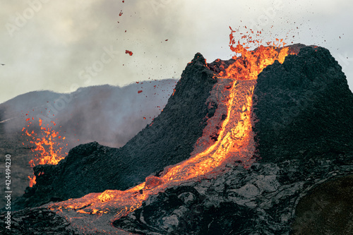 Volcanic eruption in Iceland, lava bursting from the volcano Fototapet