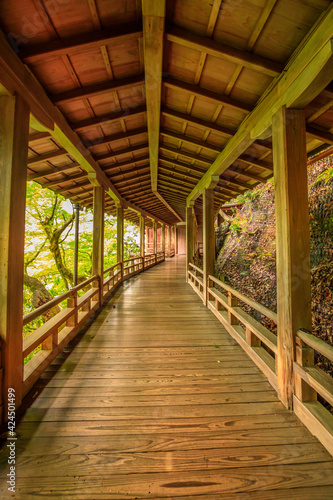 Architecture of Zen Temple Eikan-do Zenrin-ji in Higashiyama Distric, Kyoto, Japan. Wooden corridor that joins the main buildings to Tahoto Pagoda through the beautiful garden.