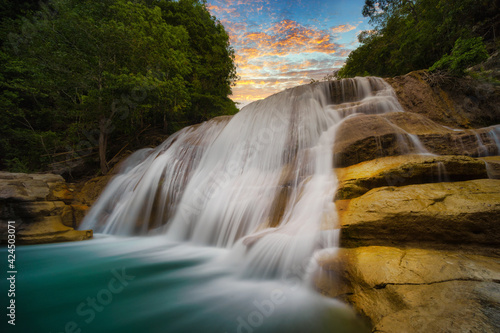 Tanggedu Waterfall at sunset, Tanggedu, Kanatang, East Sumba, East Nusa Tenggara, Indonesia photo