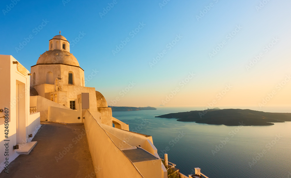 Santorini in Greece at sunset - obrazy, fototapety, plakaty 