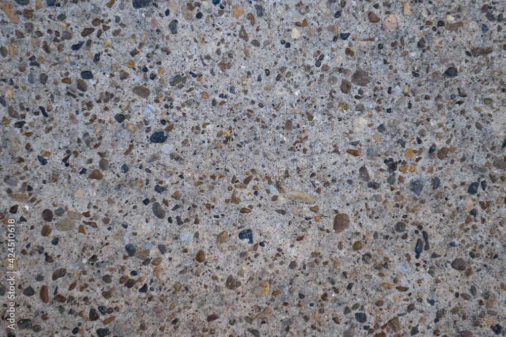 gray concrete surface with inclusions of stones gray concrete surface with inclusions of stones