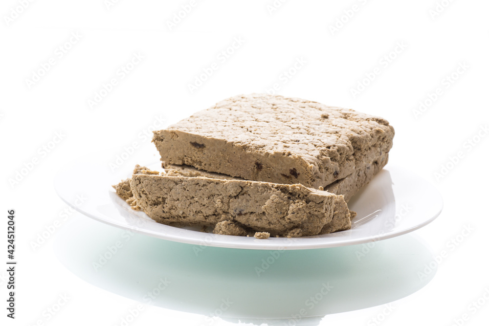 piece of sweet halva on white background piece of sweet halva on white background