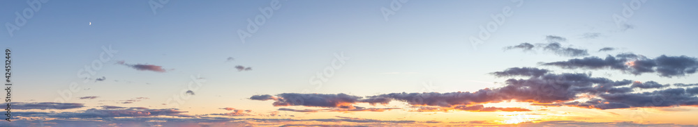 Panoramic View of Cloudscape during a colorful sunset or sunrise. Taken on the East Coast of Newfoundland, Canada.