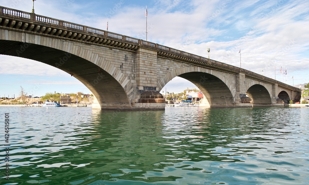 London Bridge in Lake Havasu City, Arizona. It formerly spanned the River Thames in London, England. It was then purchased and reconstructed in Arizona to attract tourism and home buyers. 