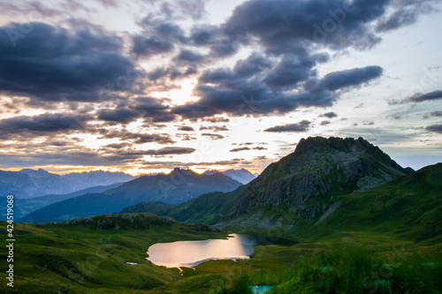 landscape with lake and mountains - Tilisuna lake (Gargellen, Vorarlberg, Austria) photo