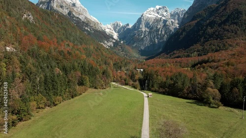 Rising aerial green valley road forest mountains beautiful landscape blue sky day photo