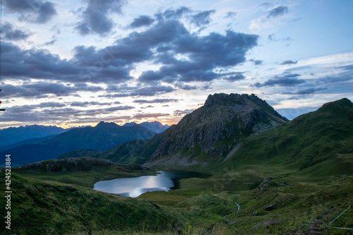 landscape with lake and mountains - Tilisuna lake (Gargellen, Vorarlberg, Austria) photo