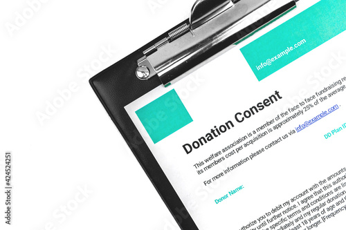 Donation consent documentation on white doctor's table, healthcare and donor concept