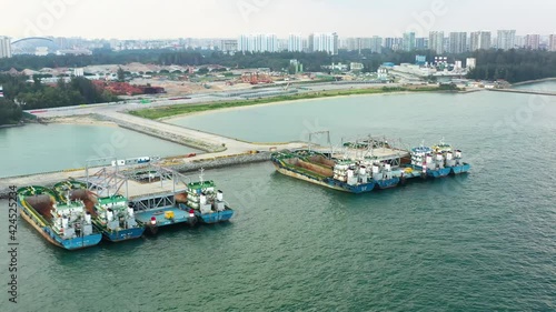 Drone shot of empty cargo ships moored, Singapore photo