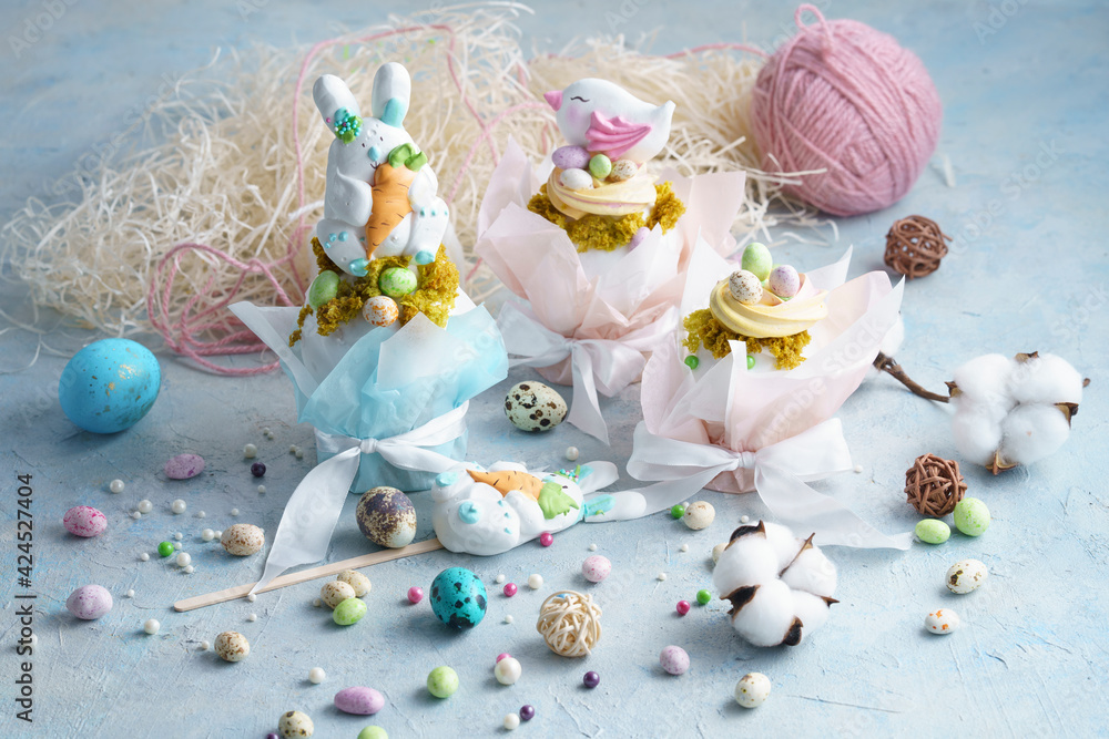 Fototapeta premium confectionery pastries, gingerbread and drawing made with the help of a pastry printer, Easter composition, Easter eggs, Easter bunny