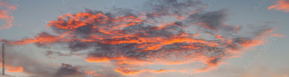panorama at sunset and a huge cloud