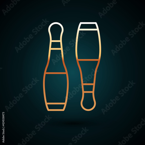 Gold line Bowling pin icon isolated on dark blue background. Juggling clubs, circus skittles. Vector
