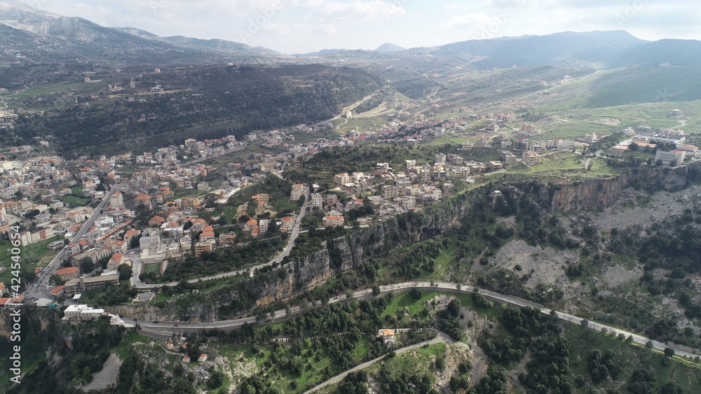 Aerial view of the city. Middle east region. Beauty of Lebanon. Houses near the valley and mountains. Spring season. Best travel destinations. Vacation time. Mountain roads