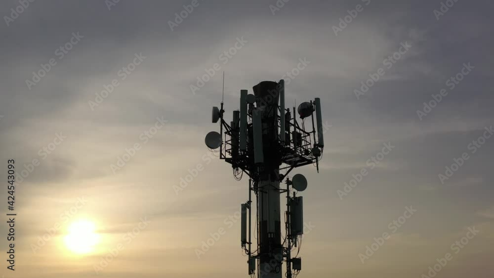 Telecommunication tower of 4G and 5G cellular. Base Station or Base Transceiver Station. Wireless Communication Antenna Transmitter. Telecommunication tower with antennas against blue sky. Telecommunication tower of 4G and 5G cellular. Base Station or Base Transceiver Station. Wireless Communication Antenna Transmitter. Telecommunication tower with antennas against blue sky.