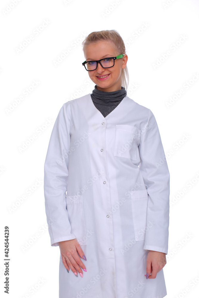 Twenty year old lady doctor in stands wearing a doctor's apron. Front view. Twenty year old lady doctor in stands wearing a doctor's apron. Front view.