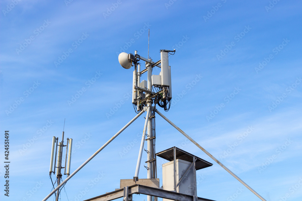 Antenna cellular base station in Russia. Equipment for of mobile telephony, wireless computer networking and other wireless communications. 5G,4G, 3G mobile technologies. Antenna cellular base station in Russia. Equipment for of mobile telephony, wireless computer networking and other wireless communications. 5G,4G, 3G mobile technologies.