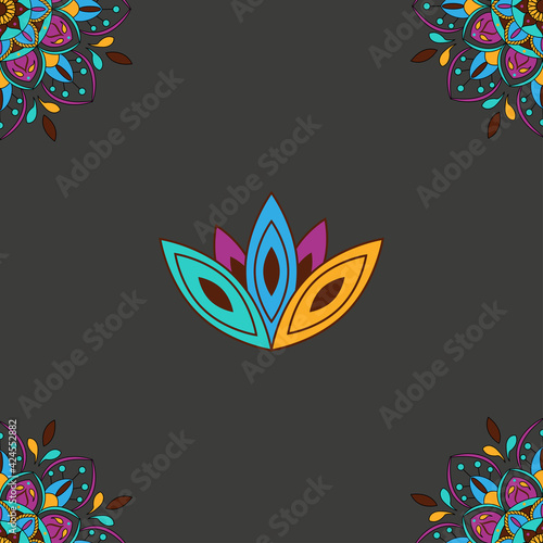 Colorful mandala and lotus pattern on dark background