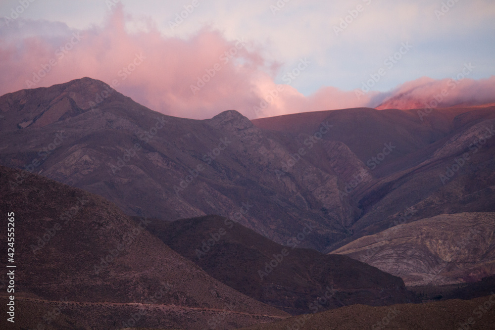 Enchanting altiplano landscape at sunset. View of the Andes mountain range and sky with a beautiful dusk light and color.
