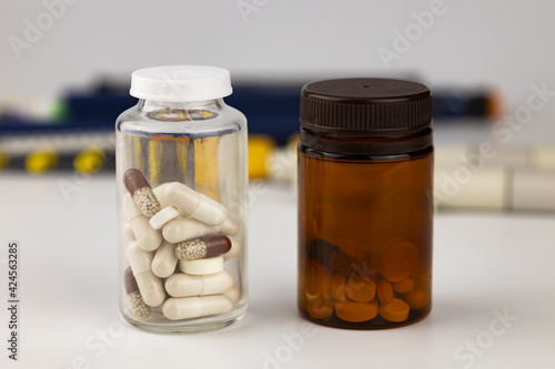 Tablet, capsules in vials. 