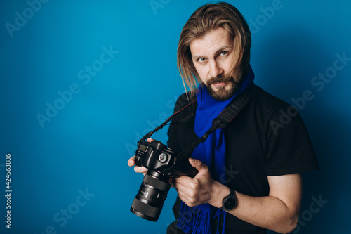 Photographer over blue background