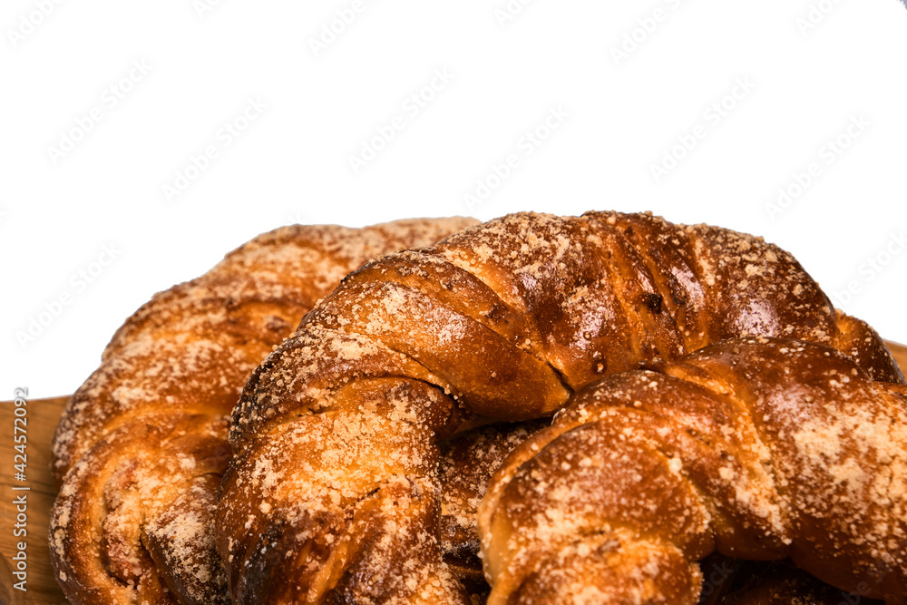 Delicious sweet sugar buns on a wooden board. Homemade baking Delicious sweet sugar buns on a wooden board. Homemade baking