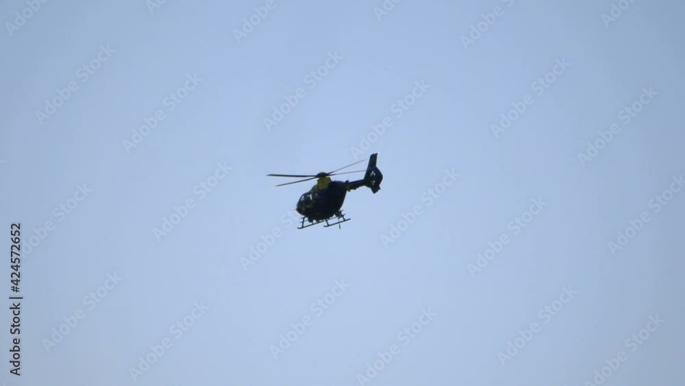 Helicopter flight on the sky in 4k slow motion 60fps Helicopter flight on the sky in 4k slow motion 60fps