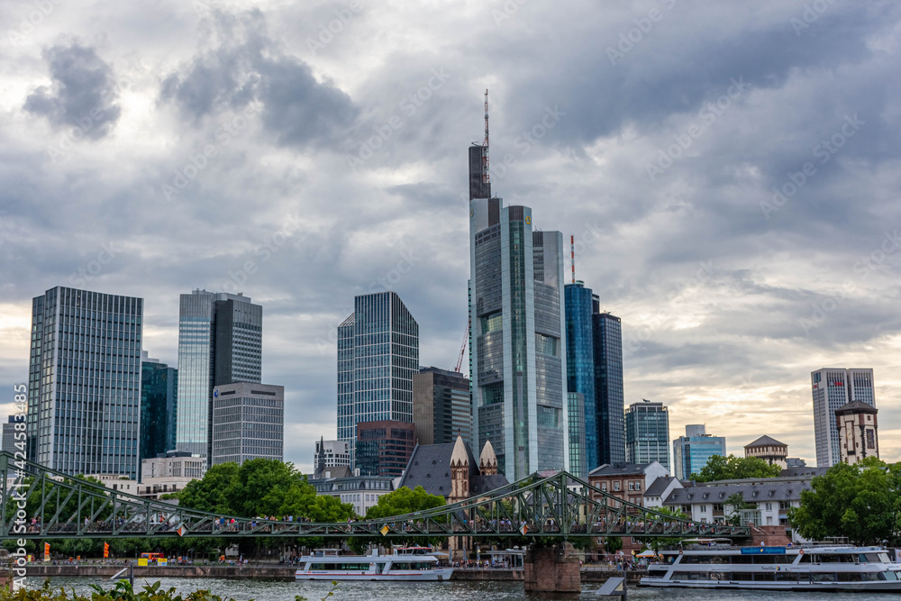 FRANKFURT, GERMANY, 25 JULY 2020: View on the financial district with Main river in Frankfurt city FRANKFURT, GERMANY, 25 JULY 2020: View on the financial district with Main river in Frankfurt city